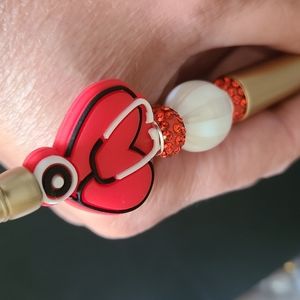 Three beaded pens for healthcare members